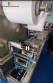 Indata automatic thermoforming, packaging, and sealing machine for blister packaging.