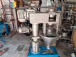 Screw dispenser for powdered products