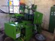 Factory line for the production of zipper sliders for clothing