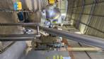 Inclined screw conveyor with stainless steel silo