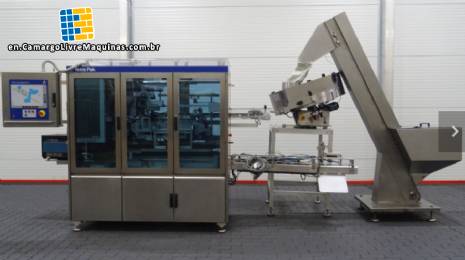 Automatic Tetra Cap Applicator 45 for helicap 27 caps and 1000 ml square Tetra Pak packaging.