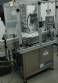 Rotary filling line for dropper bottles with Certo cylindrical self-adhesive labels