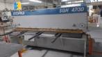 Guillotine press for cutting sheet metal