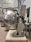 Coater with stainless steel bowl and carbon steel body