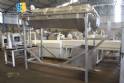 Rotary automatic corn huller
