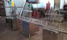 Linear filling machine with 6 stainless steel spouts