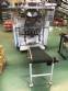 Packing machine for bale packets