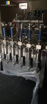 Linear filling machine with 6 pistons filling system