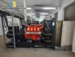 Electric generator with combustion engine