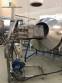 Rotary industrial roaster for roasting grains