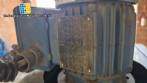 Labeling machine with steam sleeve tunnel and bottle baler