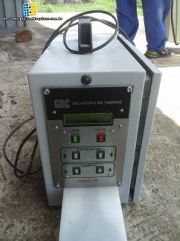 Induction sealer for lids GRC