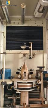 Automatic labeler for shrink sleeve labels