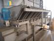 Horizontal cartoner with automatic crayon feeder