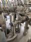 Zegla rotary filling machine with rinser and three-block capping system.