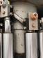 Zegla rotary filling machine with rinser and three-block capping system.