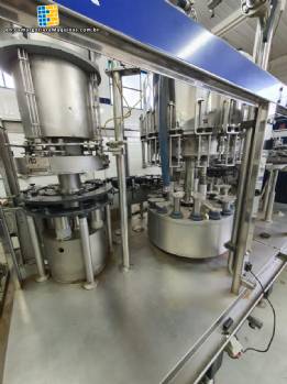 Zegla automatic three-block bottling machine with capper and rinser for wine glass bottles with corks.