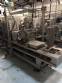 Automatic filling and sealing machine for gelatin cups, 12,000 units/hour.