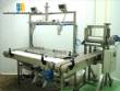 Liquid and viscous products packaging machine