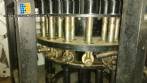 Rotating stopper press