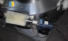 Rotary feeder of bullets and chewing gum type Flow Pack machines
