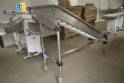 Stainless steel belt with MCI cleat