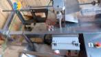 Filling machine of liquids for flexible packaging