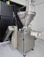 Handtmann vacuum stuffer with twister and tilting elevator, up to 6,000 kg per hour.