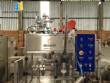 Stainless steel filling machine for beer liquids in Brabeer bottles