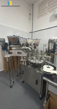 Rotary dosing and filling machine with stainless steel capping unit for pastes, 4 nozzles, Milainox, year 2022 Rotary dosing and filling machine with stainless steel capping unit for pastes, 4 nozzles, Milainox, year 2022