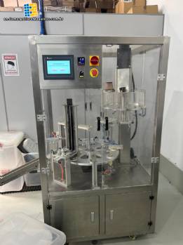 Stainless steel rotary filling and sealing machine for coffee capsules Stainless steel rotary filling and sealing machine for coffee capsules